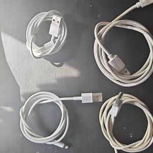 Bundle of white USB to Apple Lightning Charging Cables